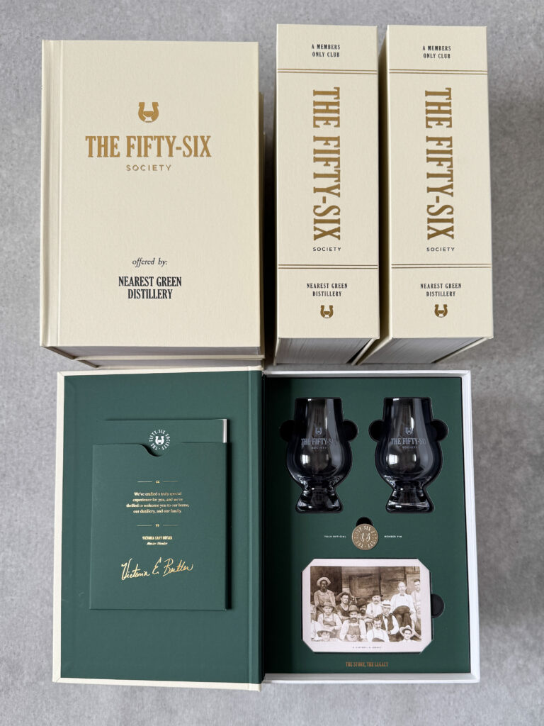 One of Nearest Green Distillery's premium corporate gifts - the Fifty-Six Society box with a signed welcome note, nosing glasses and a member pin